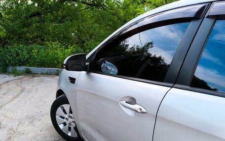 KIA Rio III рестайлинг, 2012 год, 895 000 рублей, 17 фотография
