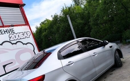 KIA Rio III рестайлинг, 2012 год, 895 000 рублей, 33 фотография