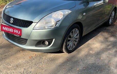 Suzuki Swift IV, 2011 год, 700 000 рублей, 3 фотография