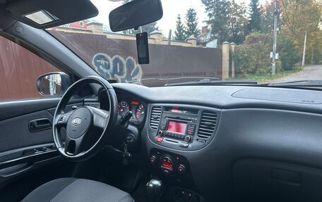 KIA Rio II, 2011 год, 689 000 рублей, 11 фотография
