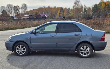 Toyota Corolla, 2004 год, 650 000 рублей, 9 фотография