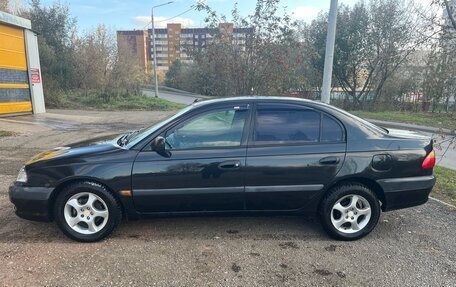 Toyota Avensis III рестайлинг, 2001 год, 360 000 рублей, 4 фотография