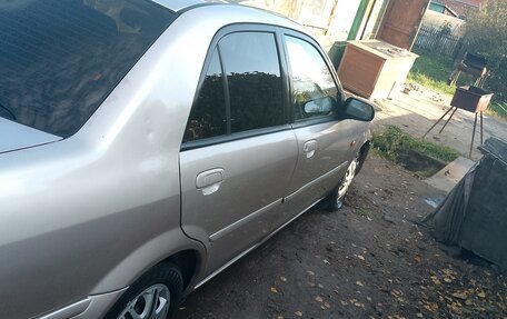 Ford Laser IV, 2002 год, 250 000 рублей, 5 фотография