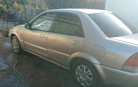 Ford Laser IV, 2002 год, 250 000 рублей, 6 фотография