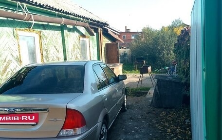 Ford Laser IV, 2002 год, 250 000 рублей, 9 фотография