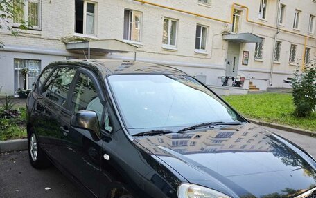 KIA Carens III (RP), 2010 год, 890 000 рублей, 3 фотография