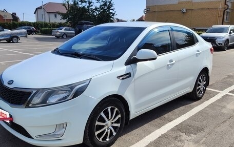 KIA Rio III рестайлинг, 2013 год, 815 000 рублей, 2 фотография