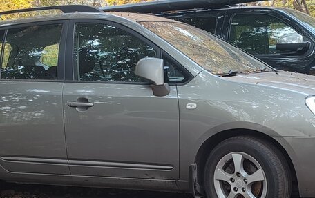 KIA Carens III (RP), 2010 год, 870 000 рублей, 7 фотография