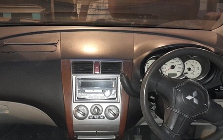 Mitsubishi Colt VI рестайлинг, 2003 год, 300 000 рублей, 10 фотография