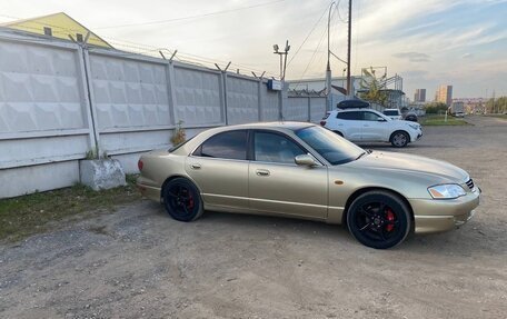 Mazda Millenia I рестайлинг, 1997 год, 370 000 рублей, 23 фотография