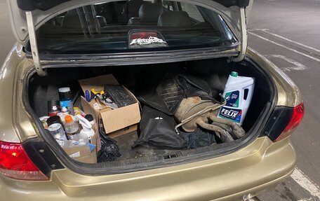 Mazda Millenia I рестайлинг, 1997 год, 370 000 рублей, 24 фотография