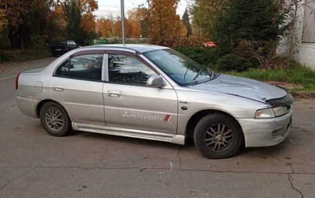 Mitsubishi Mirage VI рестайлинг, 1998 год, 140 000 рублей, 1 фотография