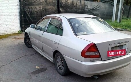 Mitsubishi Mirage VI рестайлинг, 1998 год, 140 000 рублей, 2 фотография