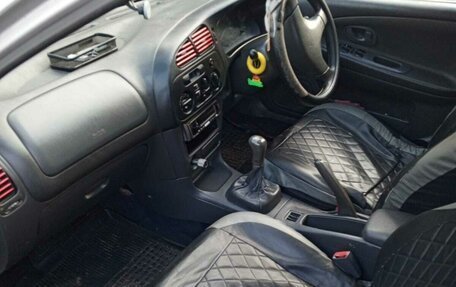 Mitsubishi Mirage VI рестайлинг, 1998 год, 140 000 рублей, 5 фотография