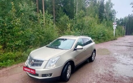 Cadillac SRX II рестайлинг, 2010 год, 810 000 рублей, 3 фотография