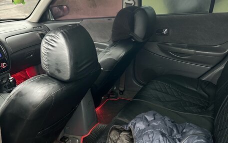 Mazda 323, 2000 год, 300 000 рублей, 14 фотография