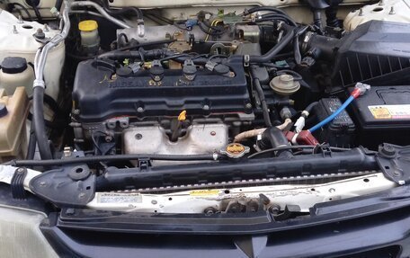 Mazda Familia Y11, 1999 год, 450 000 рублей, 10 фотография