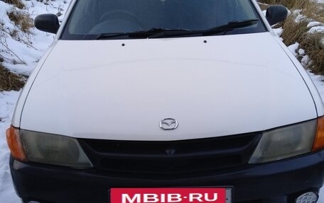 Mazda Familia Y11, 1999 год, 450 000 рублей, 3 фотография