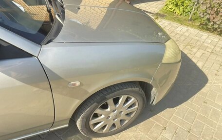 Nissan Wingroad III, 2002 год, 350 000 рублей, 10 фотография