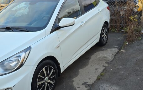 Hyundai Solaris II рестайлинг, 2011 год, 630 000 рублей, 8 фотография