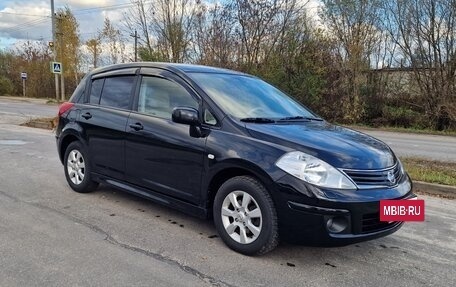 Nissan Tiida, 2011 год, 950 000 рублей, 13 фотография
