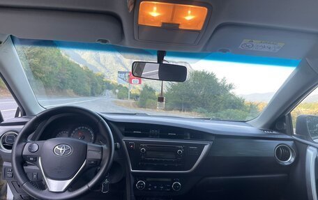 Toyota Auris II, 2014 год, 1 125 000 рублей, 2 фотография