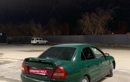 Mitsubishi Lancer VII, 1996 год, 146 000 рублей, 3 фотография