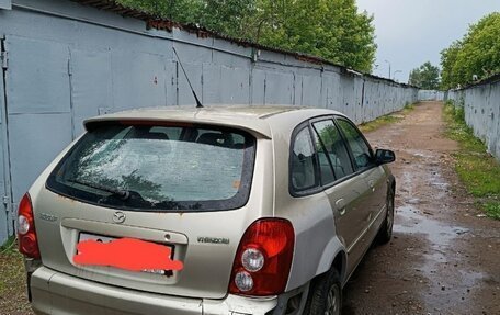 Mazda 323, 2003 год, 270 000 рублей, 9 фотография