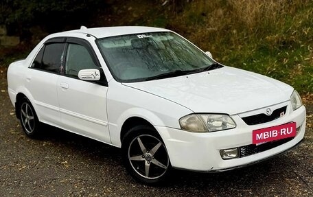 Mazda Familia, 1999 год, 399 000 рублей, 3 фотография