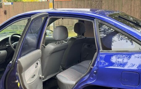 KIA Avella, 1999 год, 245 000 рублей, 18 фотография