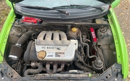 Opel Tigra, 1996 год, 300 000 рублей, 10 фотография