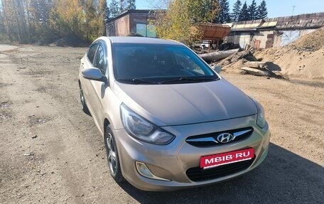 Hyundai Solaris II рестайлинг, 2011 год, 700 000 рублей, 11 фотография