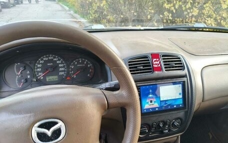 Mazda Protege, 2000 год, 90 000 рублей, 4 фотография