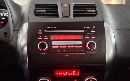 Suzuki SX4 II рестайлинг, 2010 год, 985 000 рублей, 14 фотография