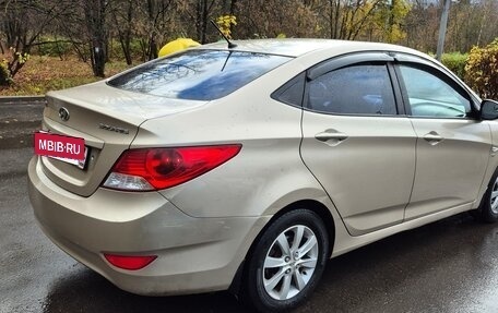 Hyundai Solaris II рестайлинг, 2011 год, 670 000 рублей, 3 фотография