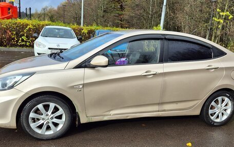 Hyundai Solaris II рестайлинг, 2011 год, 670 000 рублей, 7 фотография