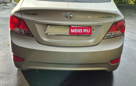 Hyundai Solaris II рестайлинг, 2011 год, 670 000 рублей, 10 фотография