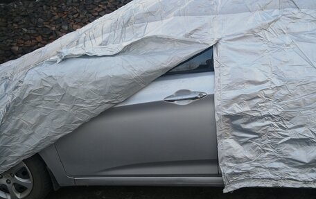 Hyundai Solaris II рестайлинг, 2011 год, 700 000 рублей, 17 фотография