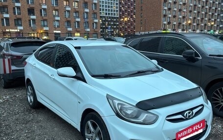 Hyundai Solaris II рестайлинг, 2011 год, 770 000 рублей, 19 фотография