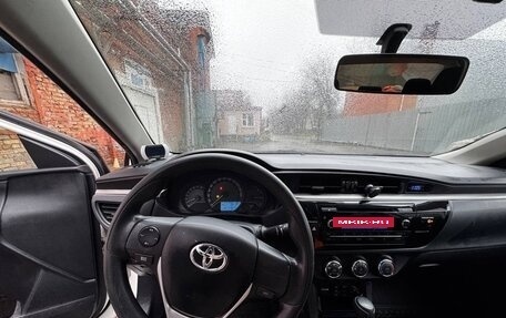 Toyota Corolla, 2013 год, 990 000 рублей, 12 фотография