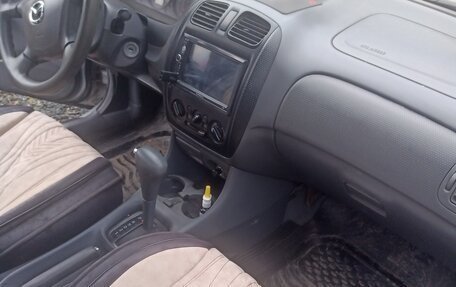 Mazda Protege, 2000 год, 320 000 рублей, 8 фотография