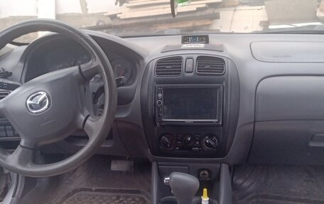 Mazda Protege, 2000 год, 320 000 рублей, 10 фотография