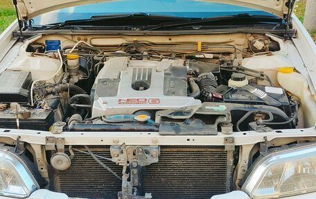 Nissan Laurel VIII, 1998 год, 600 000 рублей, 36 фотография