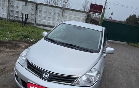 Nissan Tiida, 2010 год, 800 000 рублей, 1 фотография