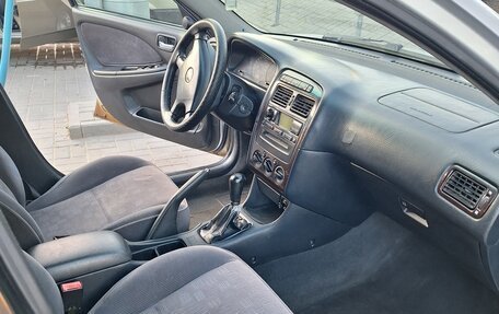 Toyota Avensis III рестайлинг, 2000 год, 450 000 рублей, 9 фотография