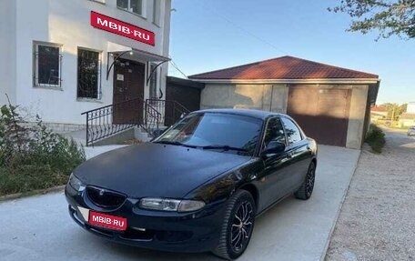 Mazda Eunos 500, 1992 год, 380 000 рублей, 1 фотография