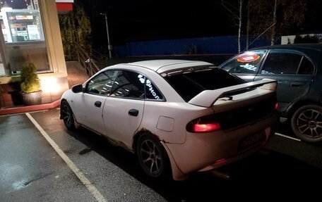 Mazda 323, 1997 год, 165 000 рублей, 9 фотография