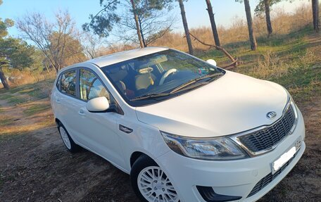 KIA Rio III рестайлинг, 2014 год, 980 000 рублей, 29 фотография