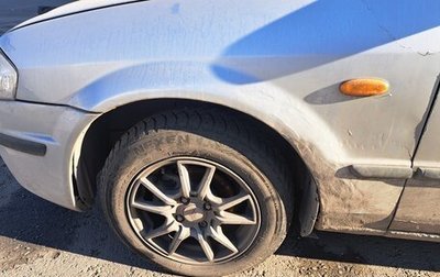 Mazda 323, 1999 год, 310 000 рублей, 1 фотография