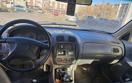 Mazda 323, 1999 год, 310 000 рублей, 2 фотография